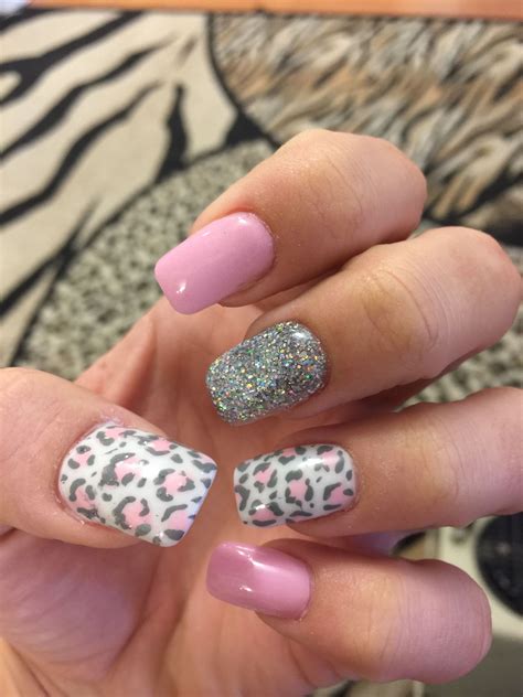 pink cheetah print nails.